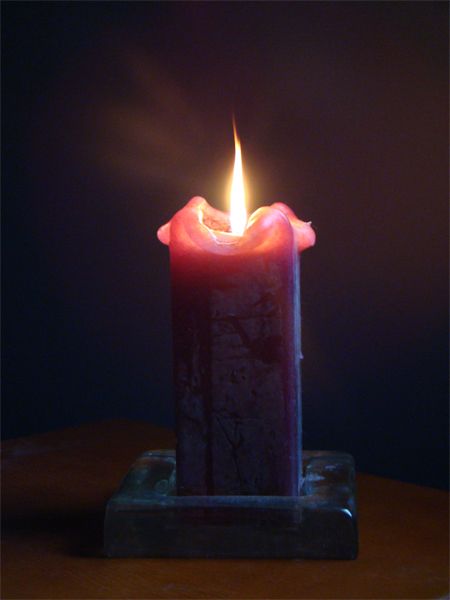 image of a candle burning at my home