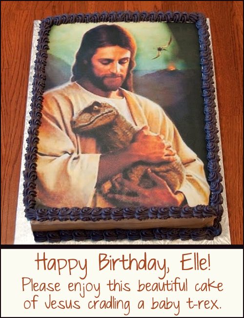 Elle's birthday cake featuring Jesus cradling a baby dinosaur.