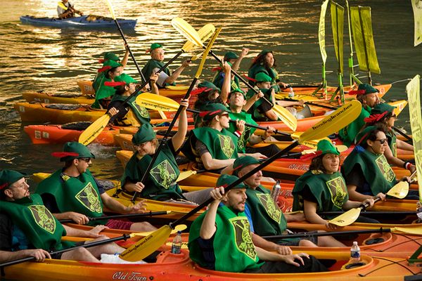 close-up image of the Robin Hoods in kayaks on the Chicago River