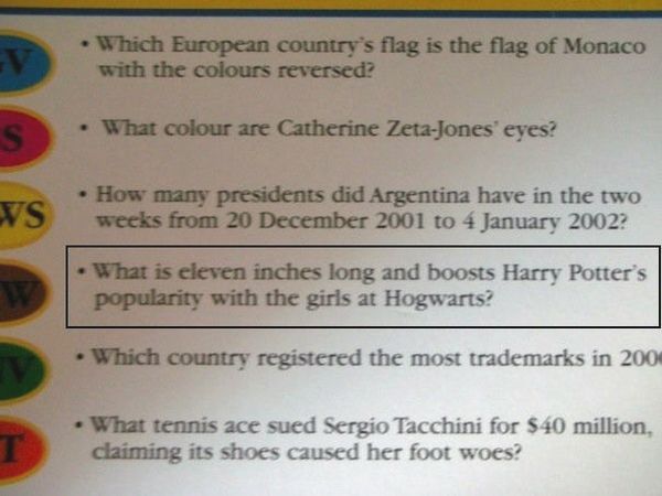 image of a Trivial Pursuit card containing the badly-worded question:'What is eleven inches long and boosts Harry Potter's popularity with the girls at Hogwarts?'