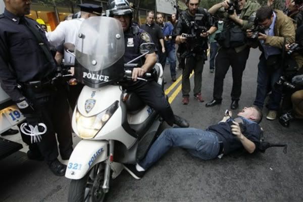 image of man being run over by police scooter