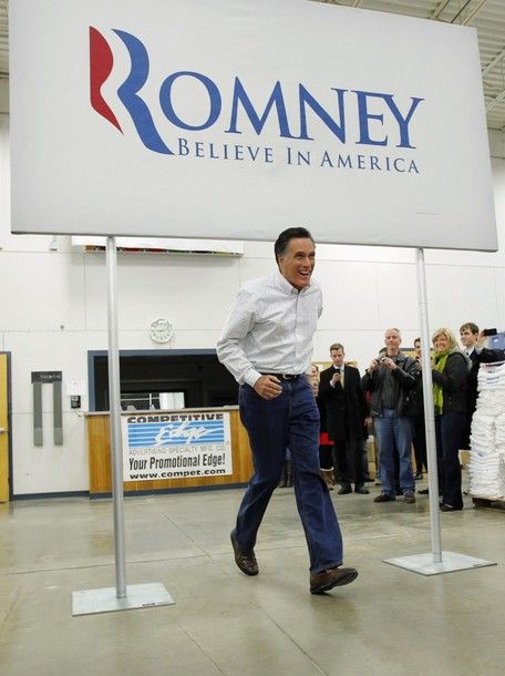 Republican presidential candidate Mitt Romney takes the stage at a campaign rally in Clive, Iowa January 2, 2012.
