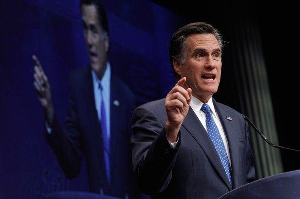 an image of Mitt Romney at CPAC, looking angry and pointing, with an image of him looking and angry and pointing on a large screen behind him