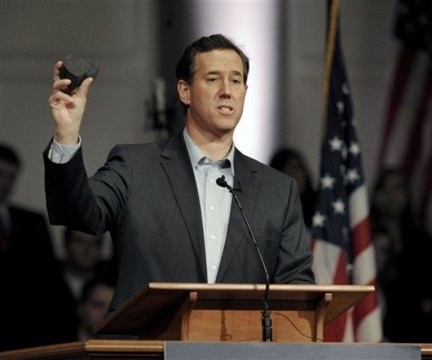 image of Rick Santorum holding up a rock