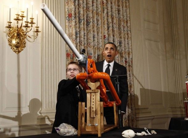 President Obama makes a dramatic 'woo' face watching the marshmallow fly