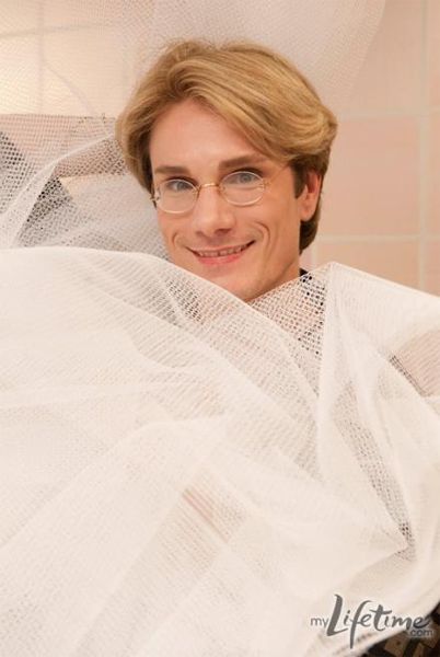 image of designer Austin Scarlett wrapped in white tulle