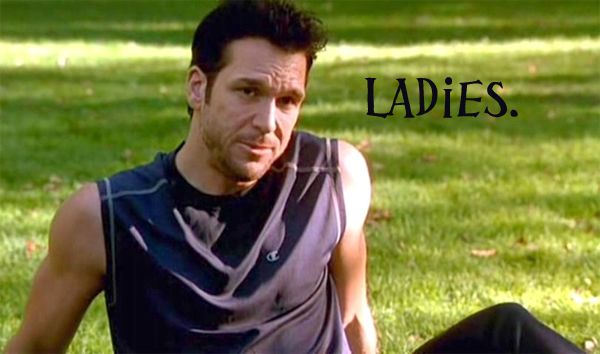image of Dane Cook sitting in the grass making a 'How you doin'?' face, to which I have added text reading 'Ladies.'