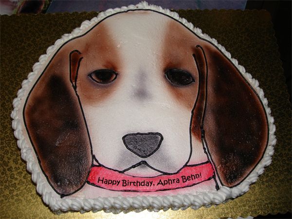 image of a beagle cake reading 'Happy Birthday, Aphra Behn!'