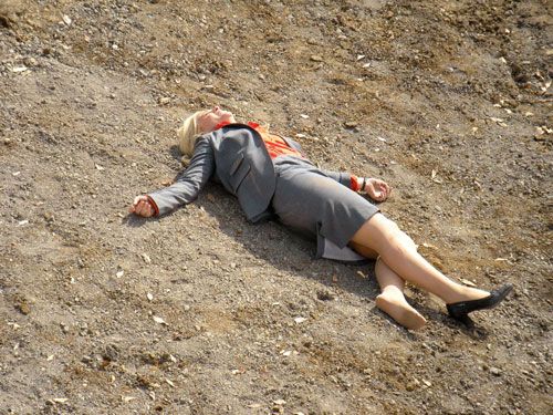 image of Leslie Knope lying in a pit on Parks and Recreation