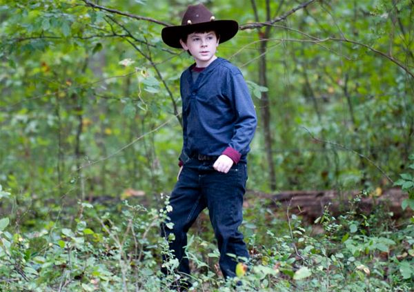 image of Carl walking through the woods
