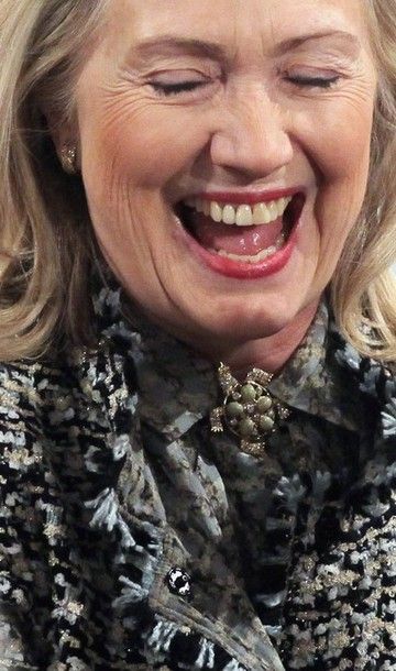 close-up image of Secretary of State Hillary Clinton laughing