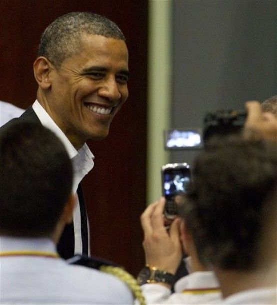 image of President Obama smiling broadly while having his picture taken