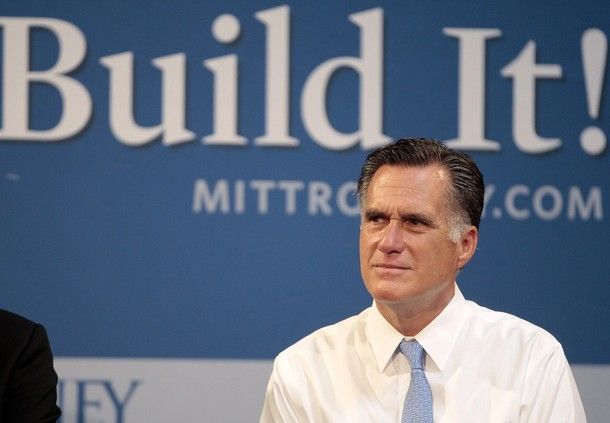 image of Mitt Romney sitting in front of a huge sign reading 'Build It! mittromney.com'
