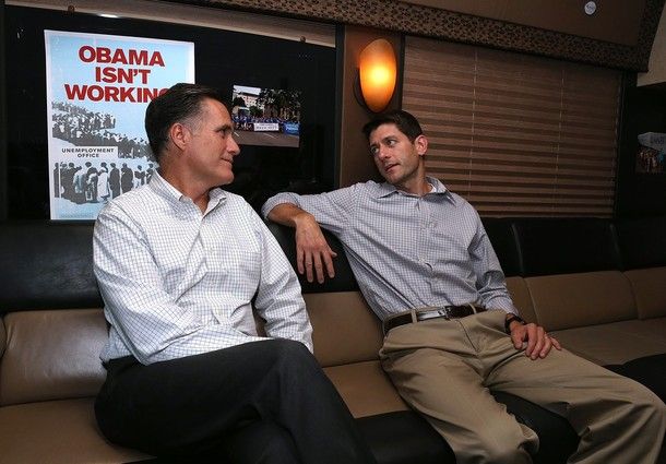 image of Romney and Ryan sitting in the Romnibus in front of a sign reading 'Obama isn't working'