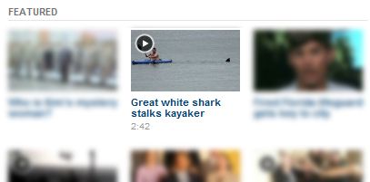 screen cap of CNN's front page promoting a video clip of a news story about a shark sighting in Cape Cod