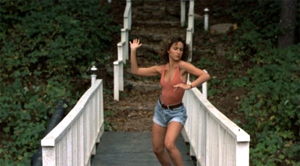 image of Jennifer Grey from Dirty Dancing, in which she is practicing her dancing on a set of outdoor stairs.