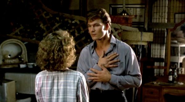 image of Patrick Swayze and Jennifer Grey from Dirty Dancing, in which Swayze is holding Grey's hand over his heart and describing his heartbeat's rhythm as 'ga-gung'.