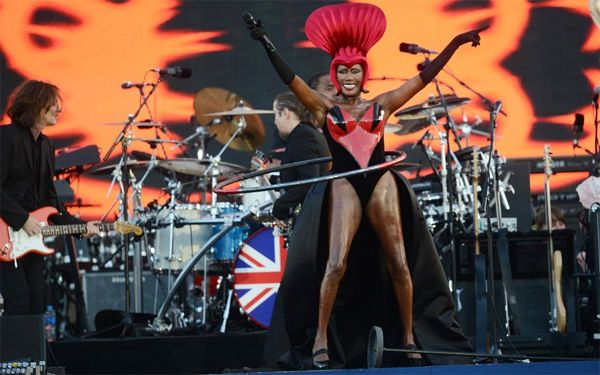 image of Grace Jones performing onstage at the Queen's Diamond Jubilee, while spinning a hula hoop