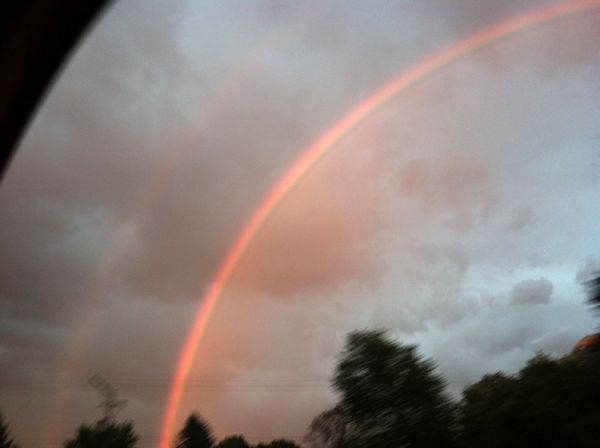 image of double rainbow from out the car window