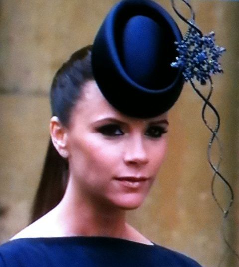 image of Victoria Beckham wearing a fascinator hat