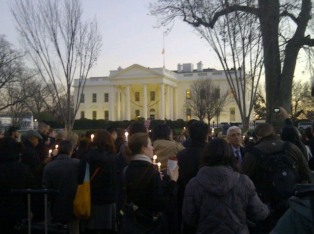 image of candlelight vigil outside the White House