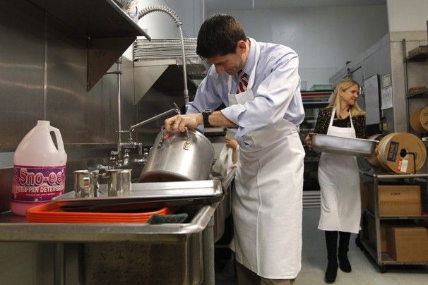 image of GOP veep nominee Paul Ryan washing an already-clean pot at a soup kitchen