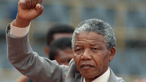 image of Nelson Mandela raising a fist of solidarity
