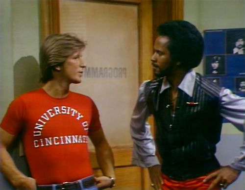 image of the characters Andy Travis and Venus Flytrap from the sitcom WKRP