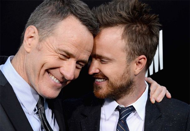 image of actors Bryan Cranston and Aaron Paul hugging each other with their heads snuggled together at the last season premiere of Breaking Bad