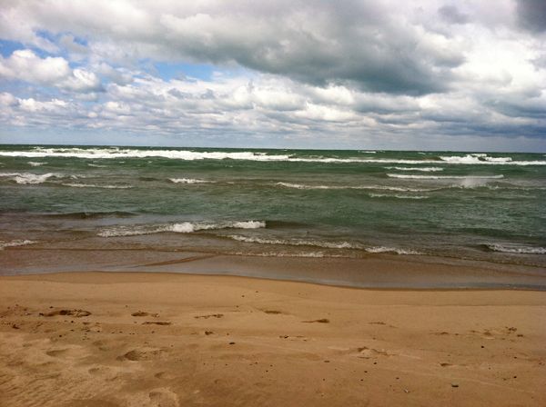 image of the lake, with short white-capped waves, and low-hanging clouds