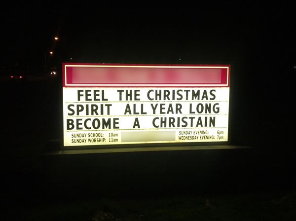 image of a church sign reading: 'Feel the Christmas Spirit All Year Long Become a Christain'
