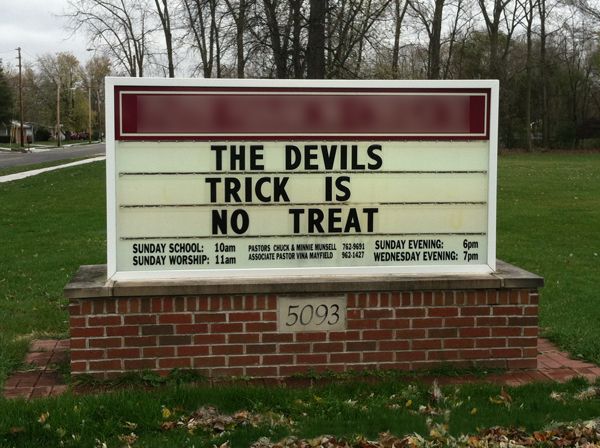 a church sign reading: 'THE DEVILS TRICK IS NO TREAT'