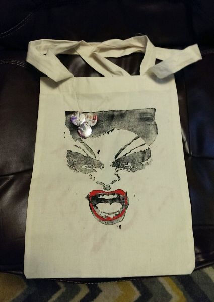 image of the bag sporting the features of Divine's face