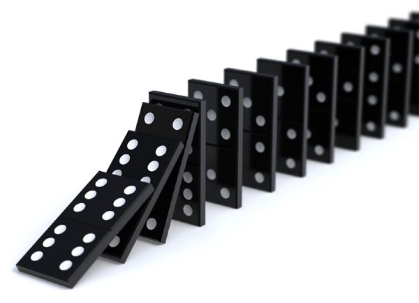 image of falling dominoes