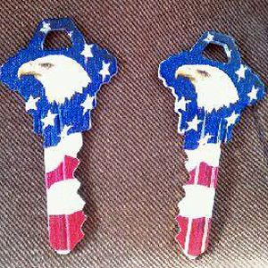 image of two red-white-and-blue housekeys emblazoned with eagles heads