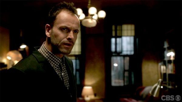 image of actor Jonny Lee Miller as Sherlock Holmes, making a confused face