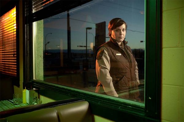 image of Allison Tolman in character as Deputy Molly Solverson, standing outside her father's diner, in Fargo