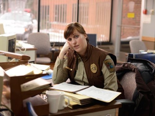image of actress Allison Tolman, an in-betweenie white woman with brown hair, in character as Deputy Molly Solverson in Fargo