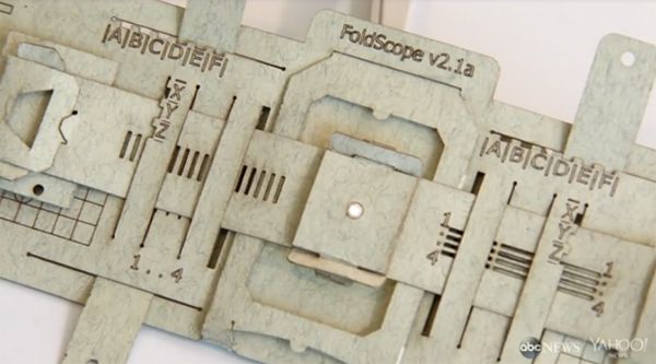 image of the FoldScope, a flat microscope made out of paper