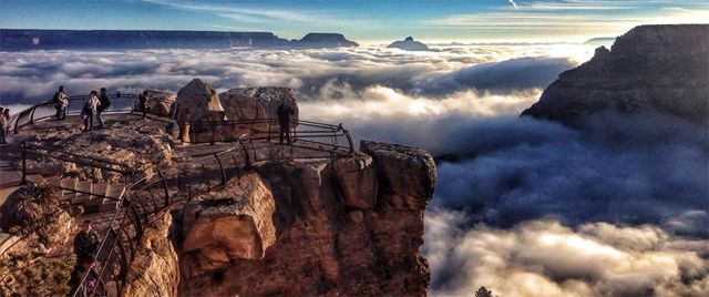 image of the Grand Canyon shot from above, filled with clouds