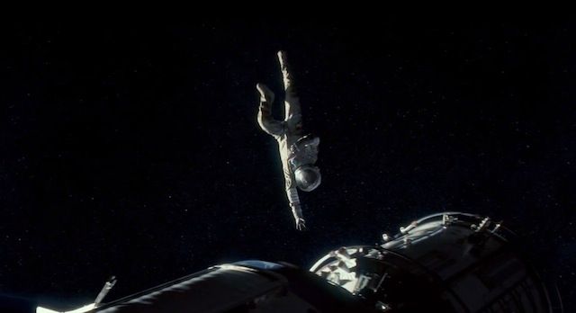 image of Sandra Bullock as Astronaut Dr. Ryan Stone floating pass part of a space station with any purchase just out of her reach