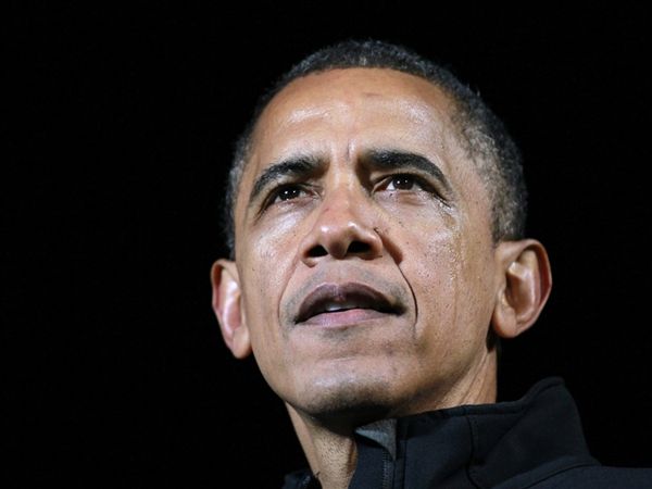 image of President Obama, with tears on his cheeks, 