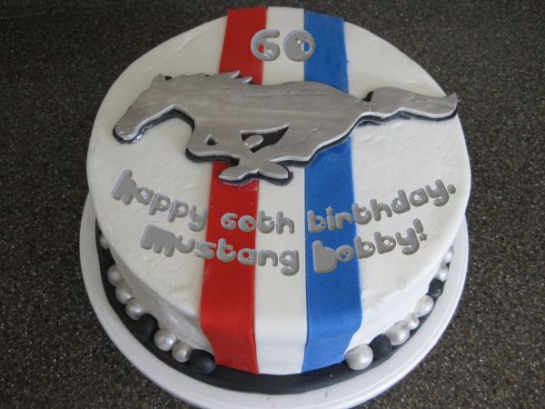 cake of a cake featuring the Mustang logo which has been photoshopped to read 'Happy 60th Birthday, Mustang Bobby!'