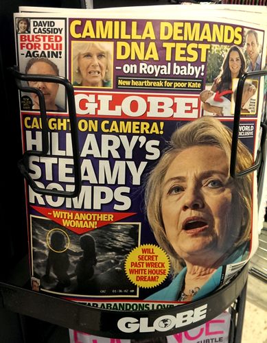 image of the Globe cover featuring the above-quoted text, a photo of Hillary Clinton with her mouth open, and a grainy black and white image of two female forms, the head of one of which is encircled in red
