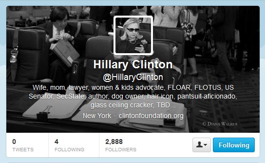 screencap of Hillary Clinton's profile picture, which is the famous picture of her looking at her mobile phone, plus her bio: 'Wife, mom, lawyer, women & kids advocate, FLOAR, FLOTUS, US Senator, SecState, author, dog owner, hair icon, pantsuit aficionado, glass ceiling cracker, TBD...'
