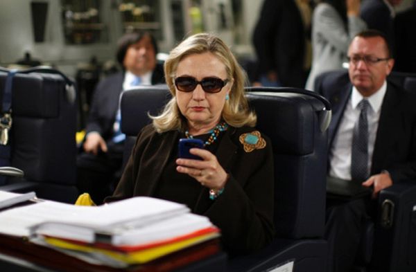 image of Hillary Clinton texting on her mobile phone