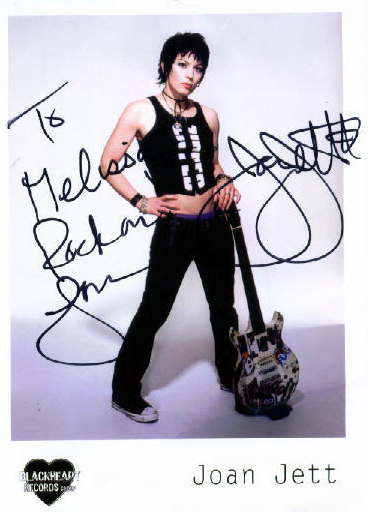 an autographed picture of Joan Jett reading: 'To Melissa: Rock on. Joan Jett.'