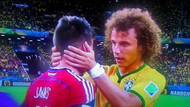 image of Luiz holding Rodriguez's face