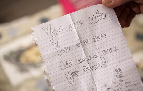 image of a handwritten note from a student, reading: 'You are who you are! Don't let anyone bring you down!'