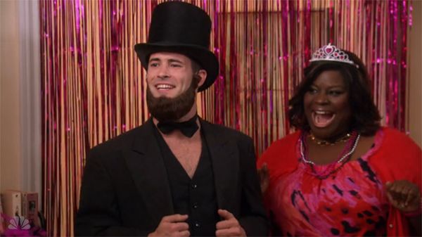 image of Donna (Retta) making a woo-hoo! face next to a stripper dressed as Abraham Lincoln at Leslie's bachelorette party